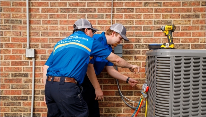 CVJ heating and air conditioning techs doing maintenance